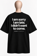 IT’S COMPLICATED.I AM SORRY. I AM LATE. — OVERSIZED UNISEX T-SHIRT BLACK